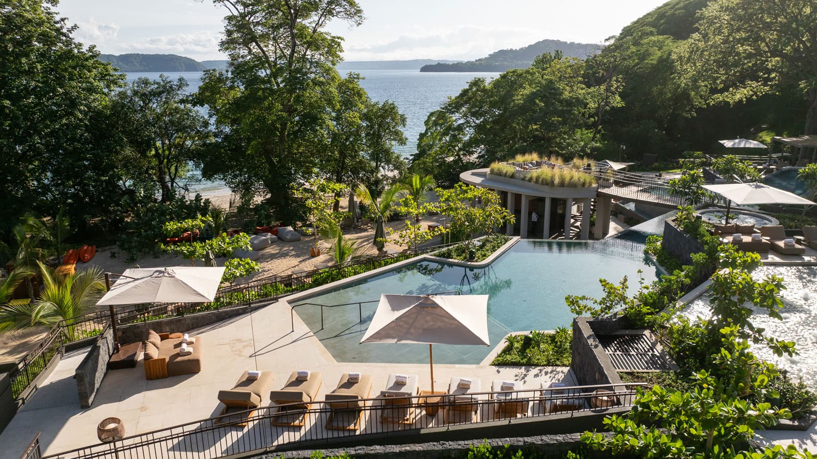 Waldorf Astoria Punta Cacique Costa Rica multi level pool area photo taken from the highest point of the terraced pools so you are able to see the area almost as a whole.